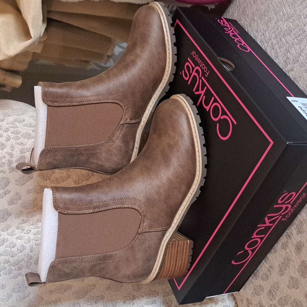 Taupe color boots.